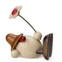 Eierkopf Oskar mit Blume liegend&hellip;